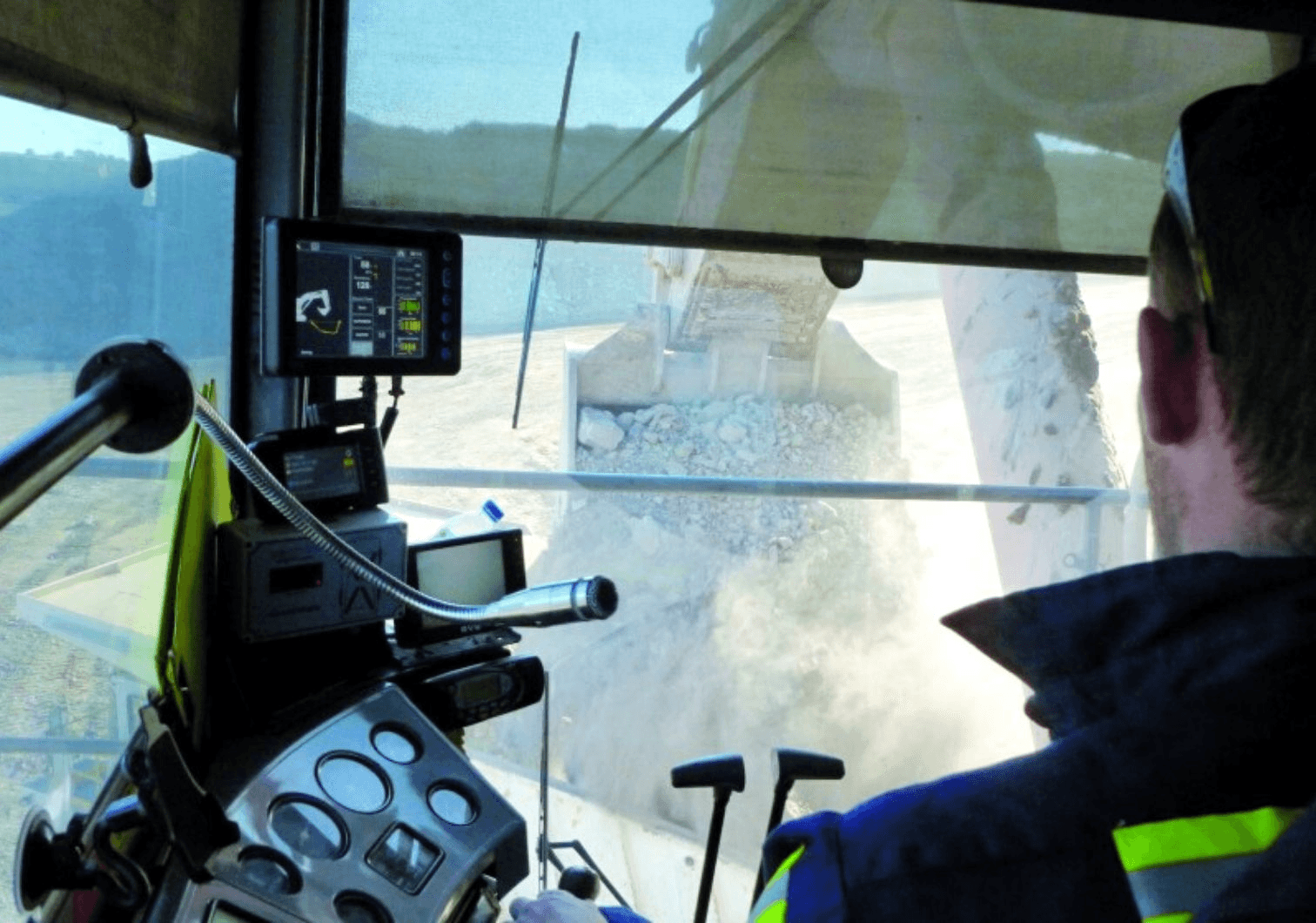 CR Digital Titan 3330 payload-monitoring display in a loader cabin.